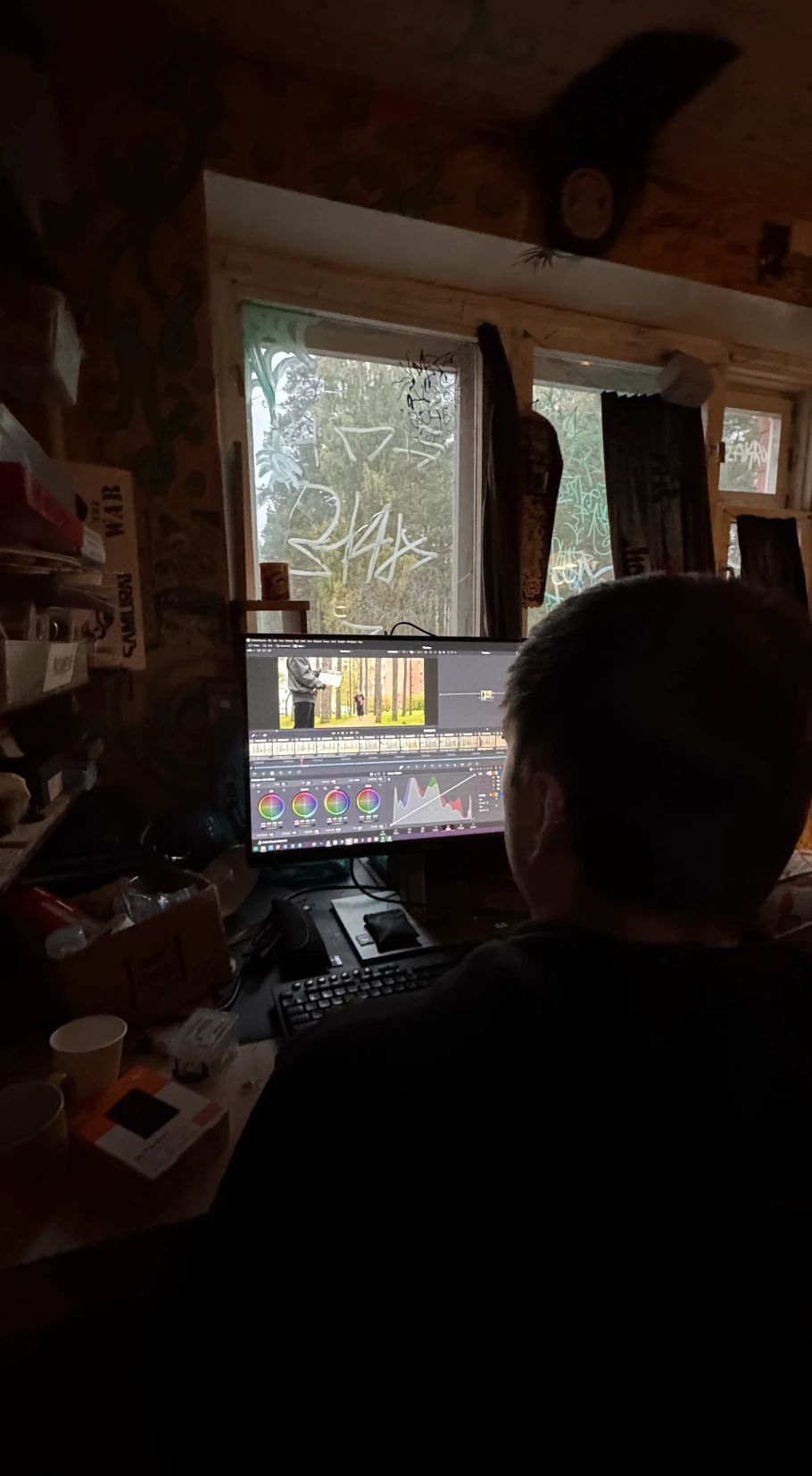 Film Camp participant editing and colour grading footage at a computer